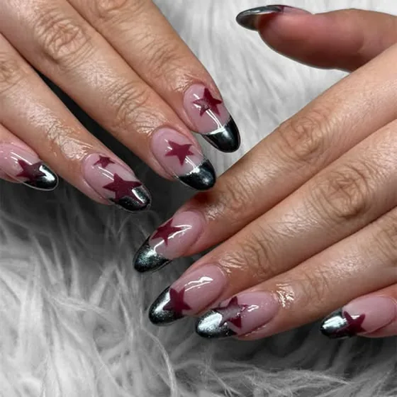 Pink and black French tips with star detail