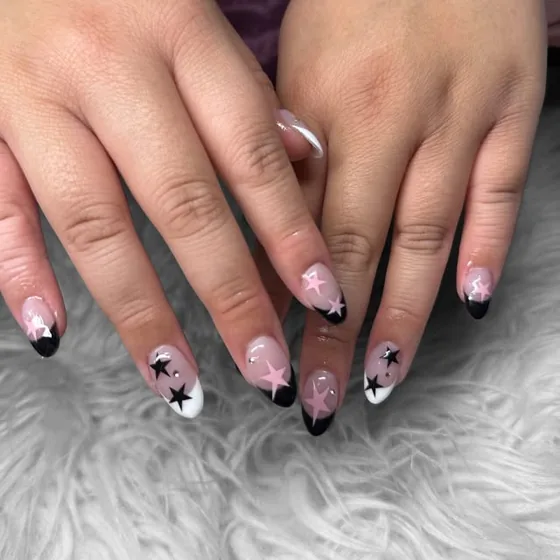 Pink and black tips with white star accents